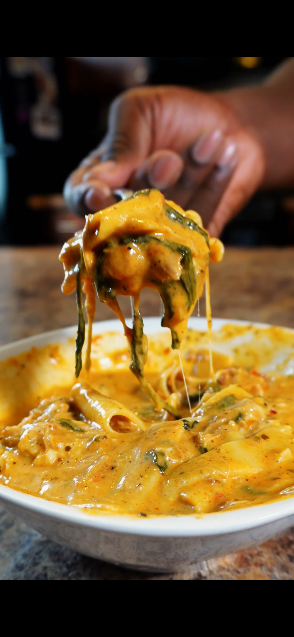 lasagna soup spoonful with cheese pull