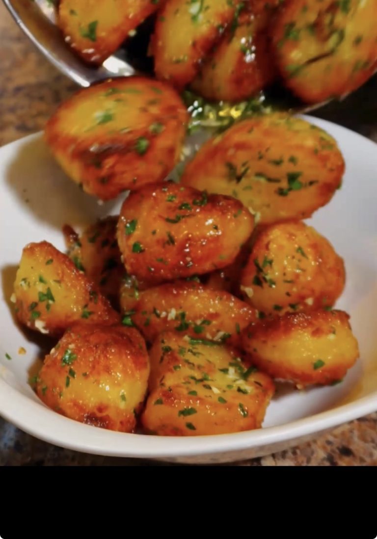 garlic and herb roasted potatoes in a bowl