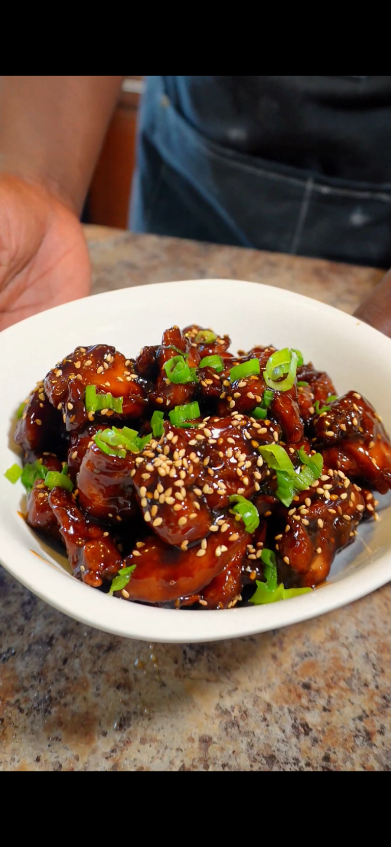 sesame chicken in a bowl