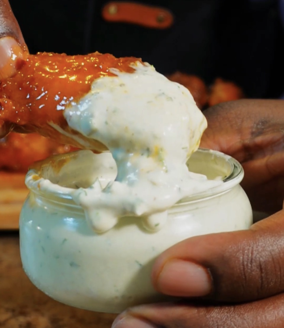 Buffalo Chicken Wing with Blue Cheese Ranch on it