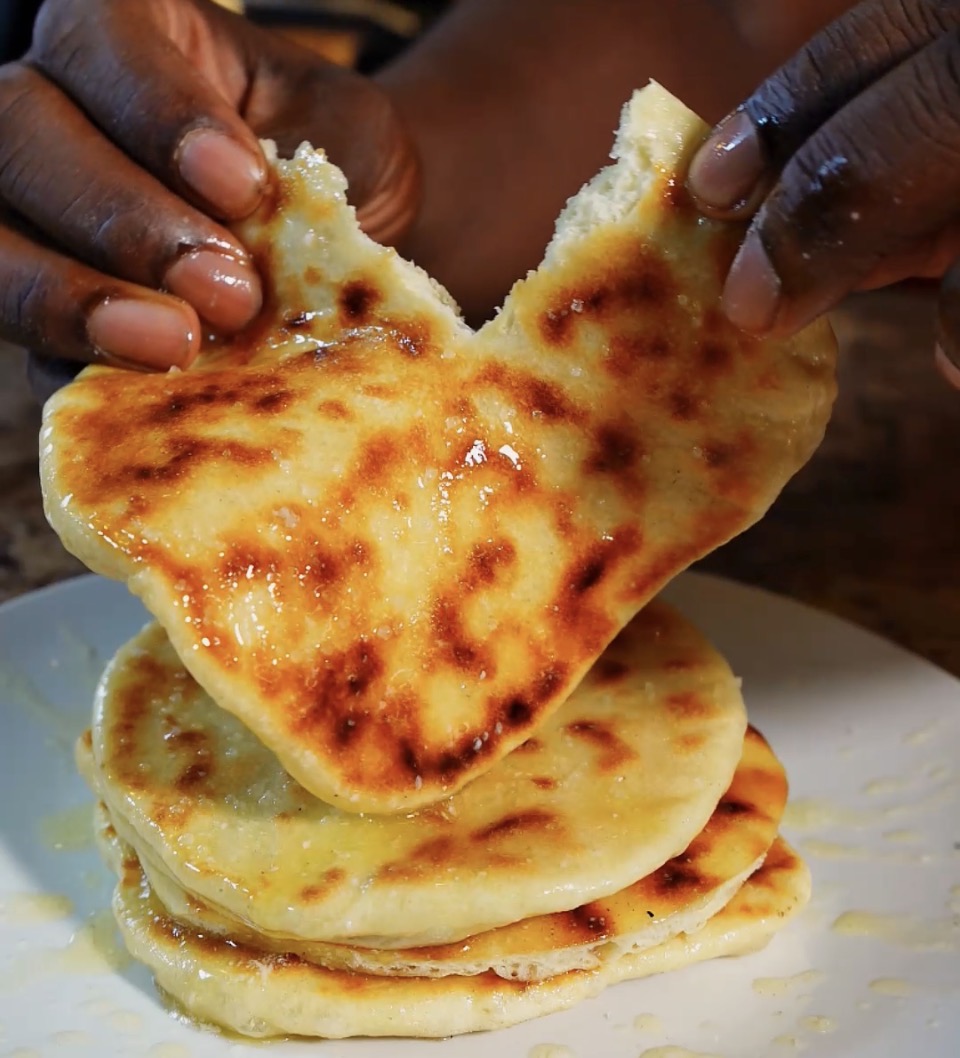Naan being torn