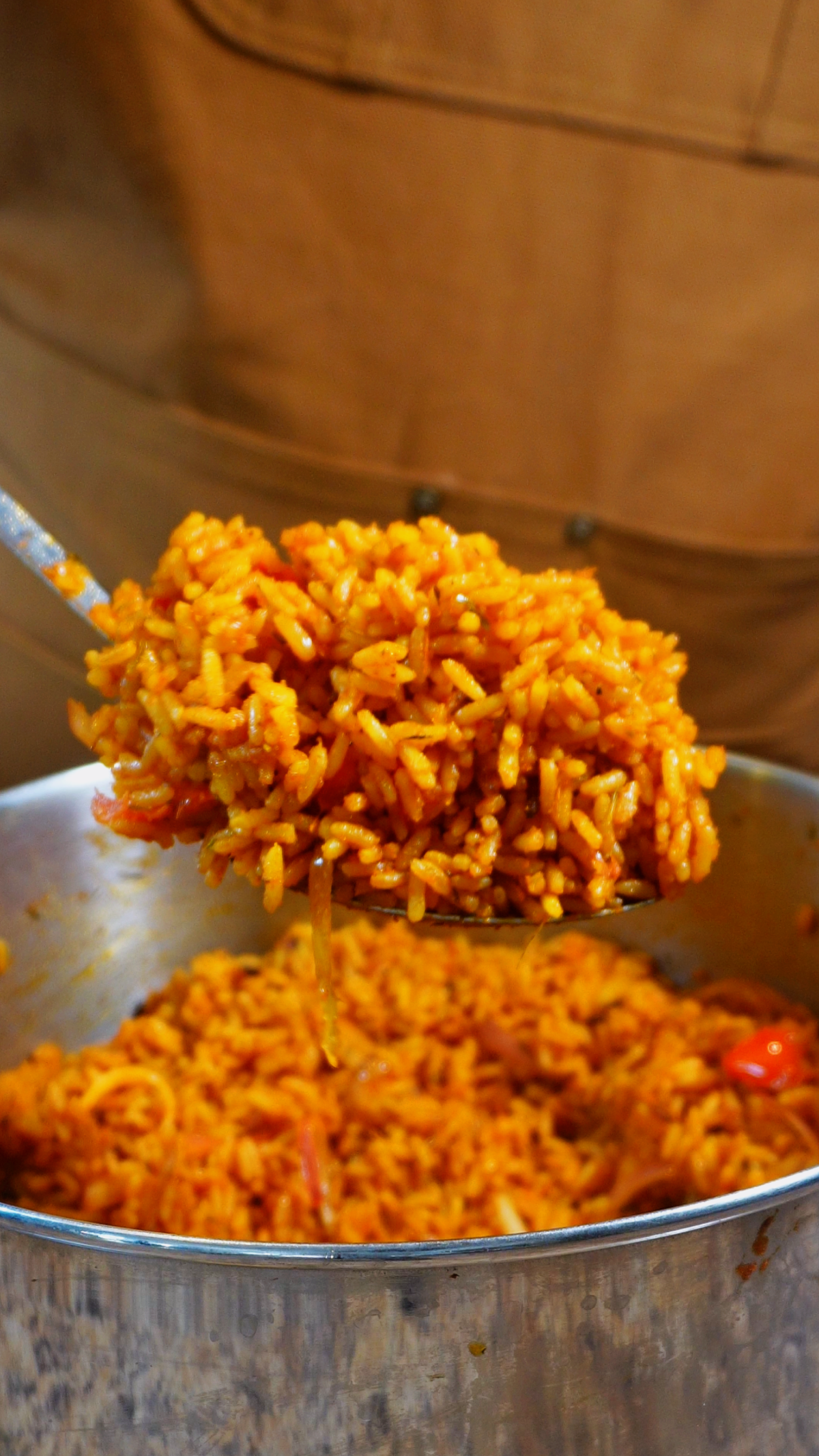 jollof rice on a spoon