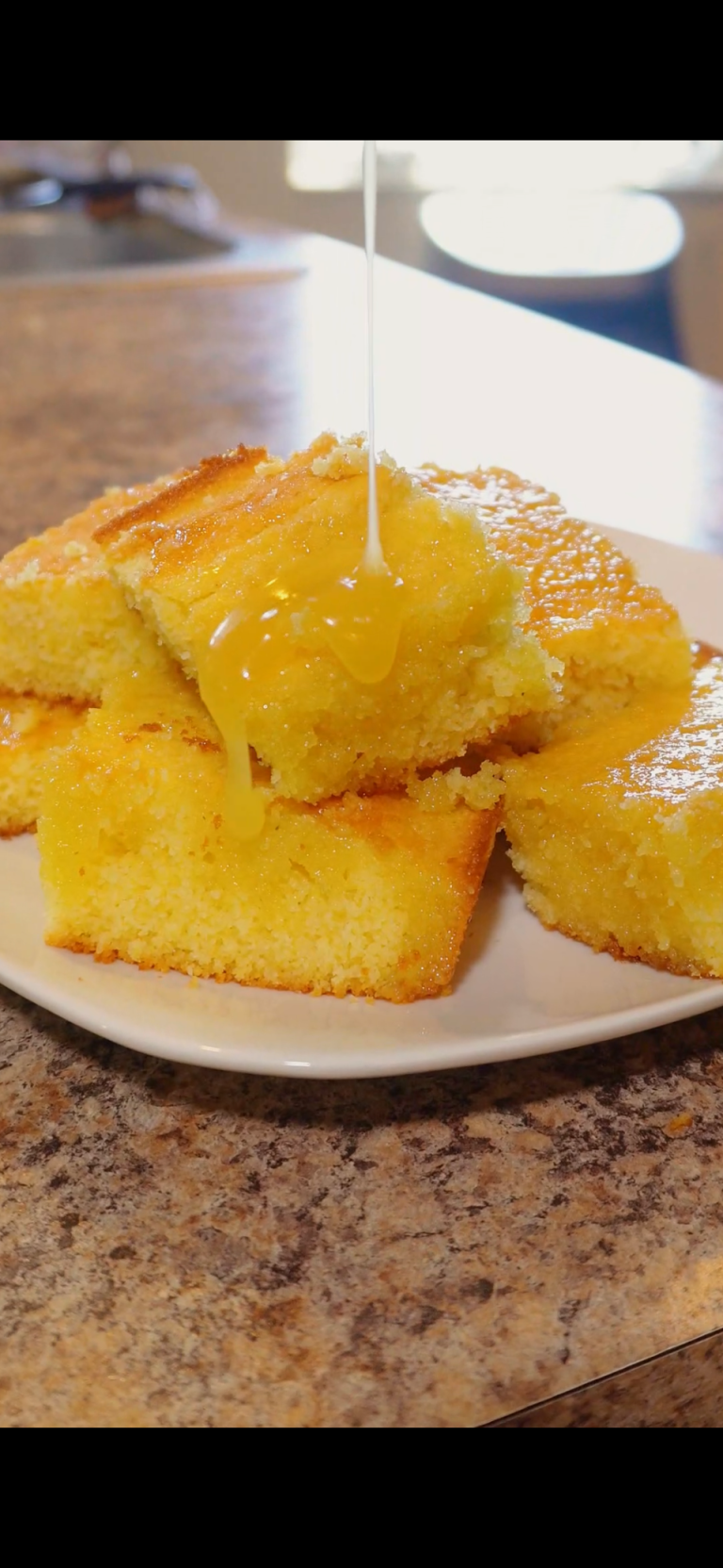 Cornbread with honey butter poured over