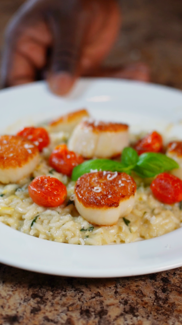 spinach and artichoke risotto with roasted tomatoes and pan seared scallops